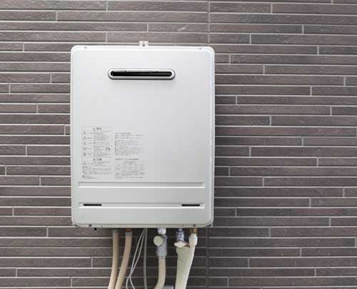 Seattle Plumber tracking down water leaks behind bathroom wall